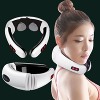 White neck and shoulder massager with red lights worn by a woman on a white background